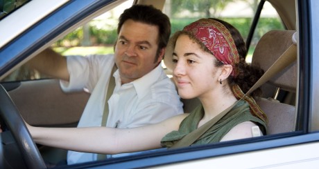 dad teaching daughter how to drive