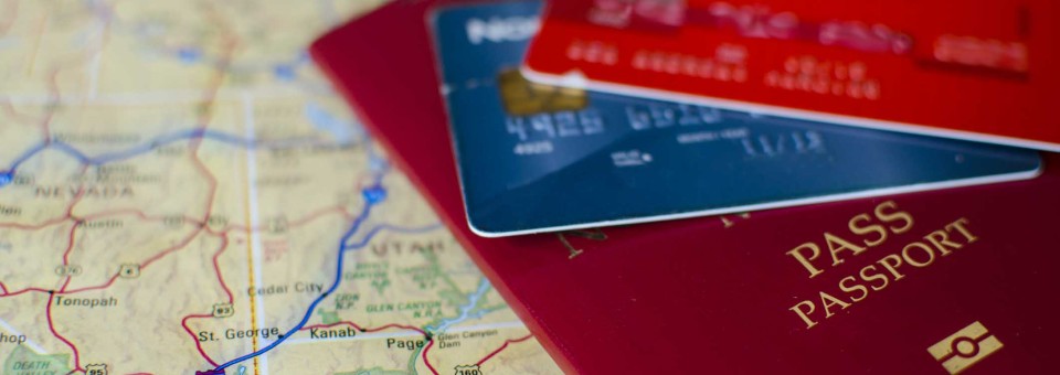 credit-card-and-passport-on-map